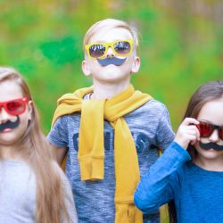 They wear fake mustaches and it works. Absurdity follows absurdity